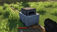 A minecart with a rail can be powered using coal and charcoal (Image via Minecraft)